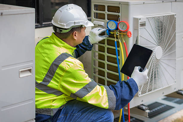 Professional Air Conditioning Repair technician working in Milton, WV